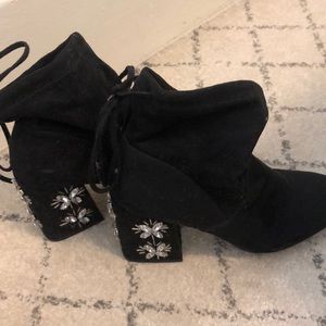 Black boots with bedazzled heels